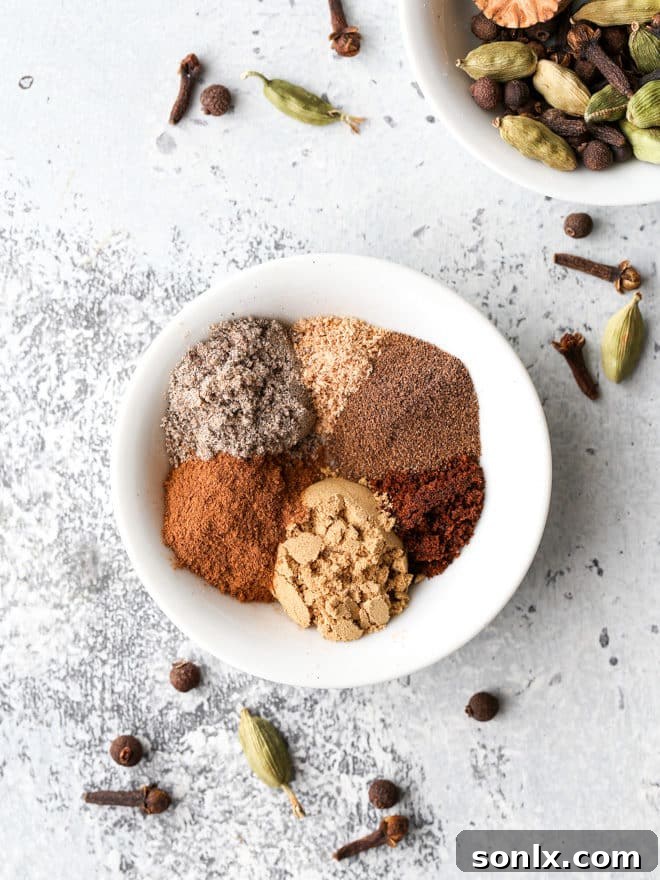 A selection of aromatic spices ready for making a homemade chai spice blend for cookies.