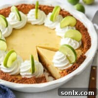 sliced key lime pie in pie pan