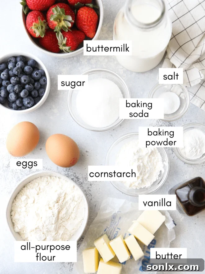 A flat lay photograph showcasing all the fresh ingredients needed for the best buttermilk waffles recipe