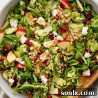 Brussels Sprouts and Farro Salad in a bowl with spoon