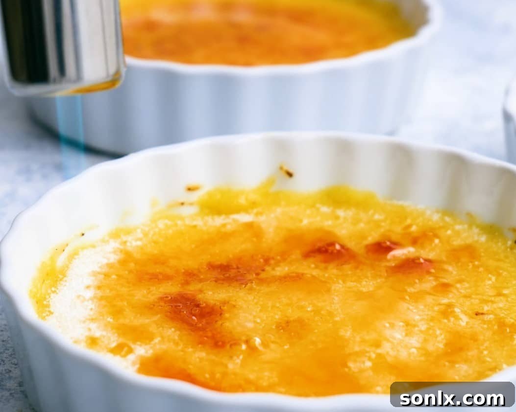 torching the top of the creme brulee