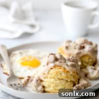 Flaky buttermilk biscuits with homemade sausage gravy is a breakfast no one can resist!