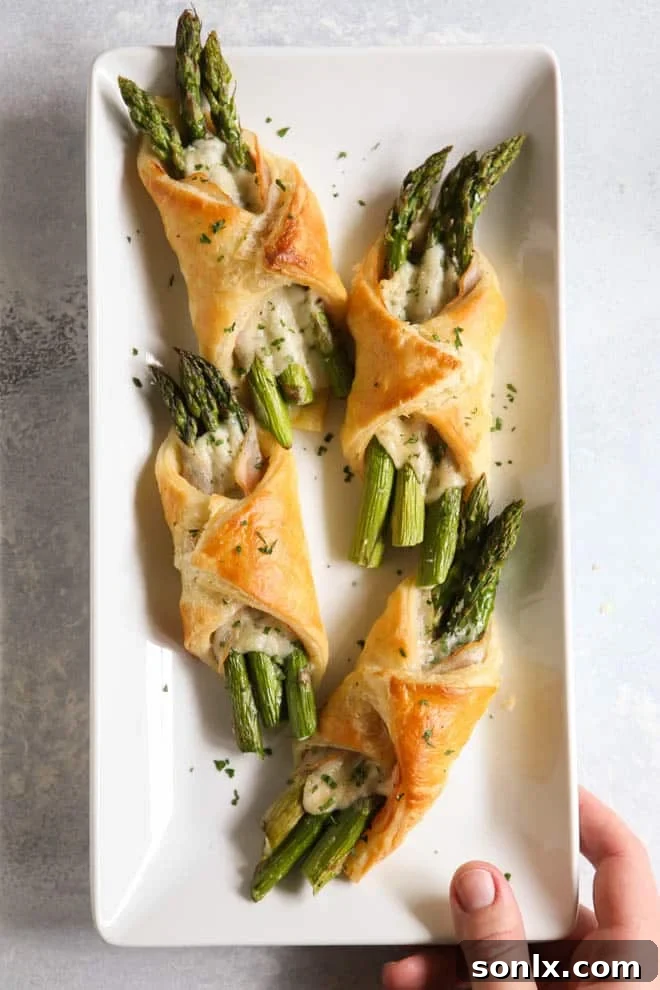 Flaky asparagus, pancetta, and puff pastry bundles make an easy but fancy appetizer for any occasion.
