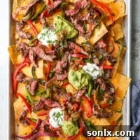 steak fajita nachos on sheet pan
