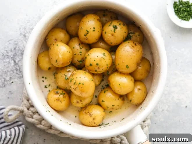 buttery boiled potatoes in pot