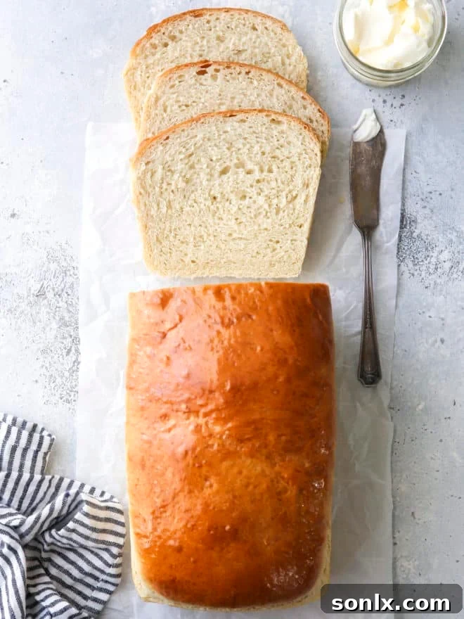 Slices of soft white sandwich bread, homemade and ready for any meal.
