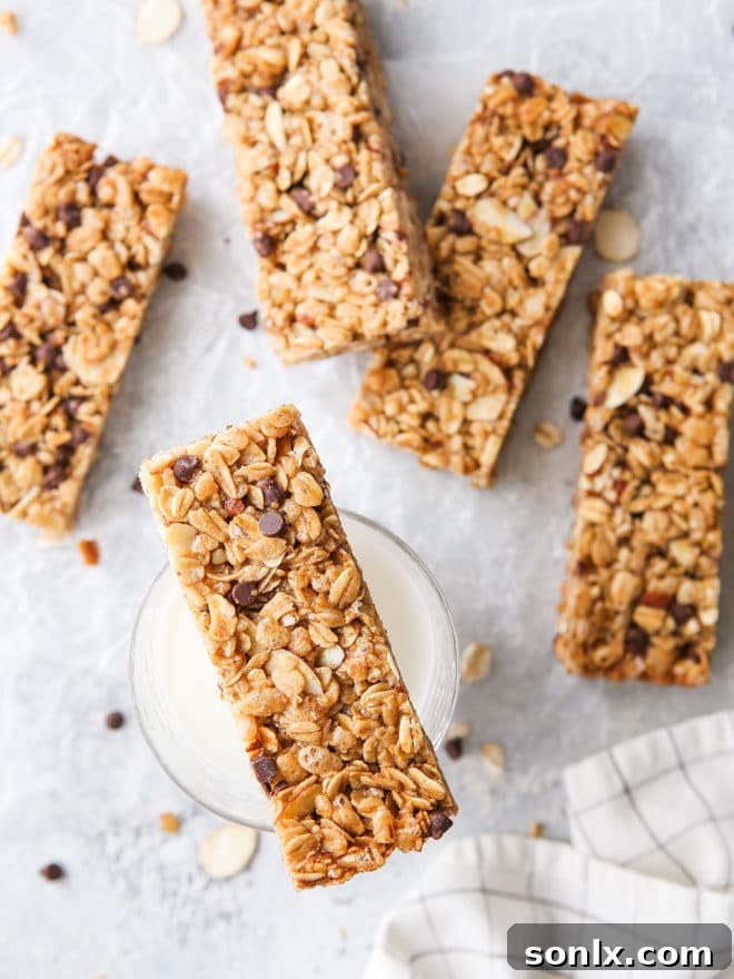 Close-up of homemade chewy chocolate chip granola bars, perfect for a satisfying snack.