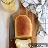 Freshly baked Yeasted Cornbread Loaf, golden brown and perfectly risen.