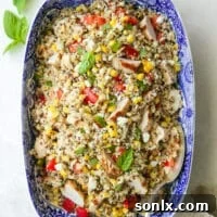 grilled chicken quinoa salad in a blue dish