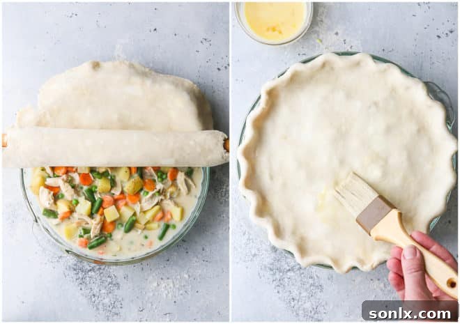 rolling pie crust over pot pie filling, and brushing with egg wash