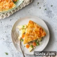 chicken pot pie slice on a plate