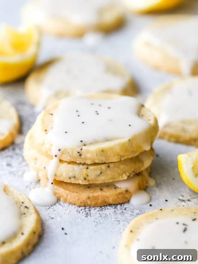 lemon poppy seed shortbread cookies stacked together