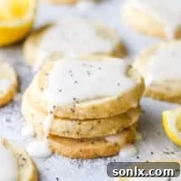 lemon poppy seed shortbread cookies stacked together
