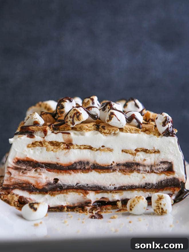 Layers of chocolate pudding, marshmallow whipped cream and graham crackers make up this S'mores Icebox Cake