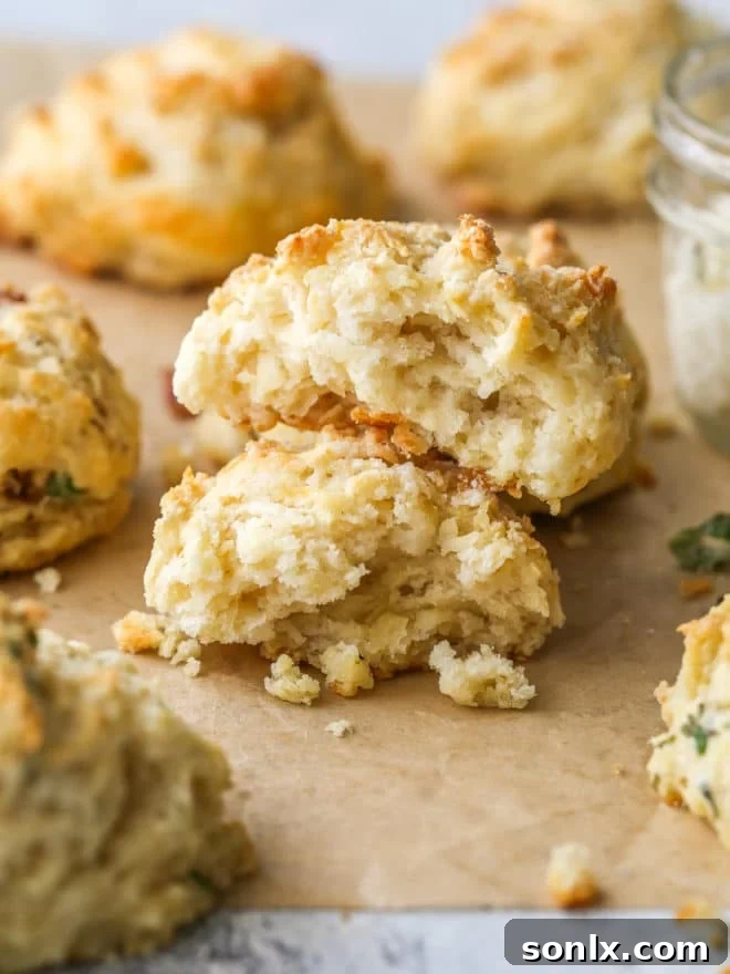 buttermilk drop biscuit torn open to see fluffy inside