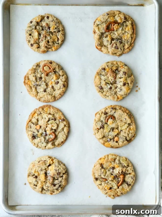 Freshly baked kitchen sink cookies cooling on a wire rack