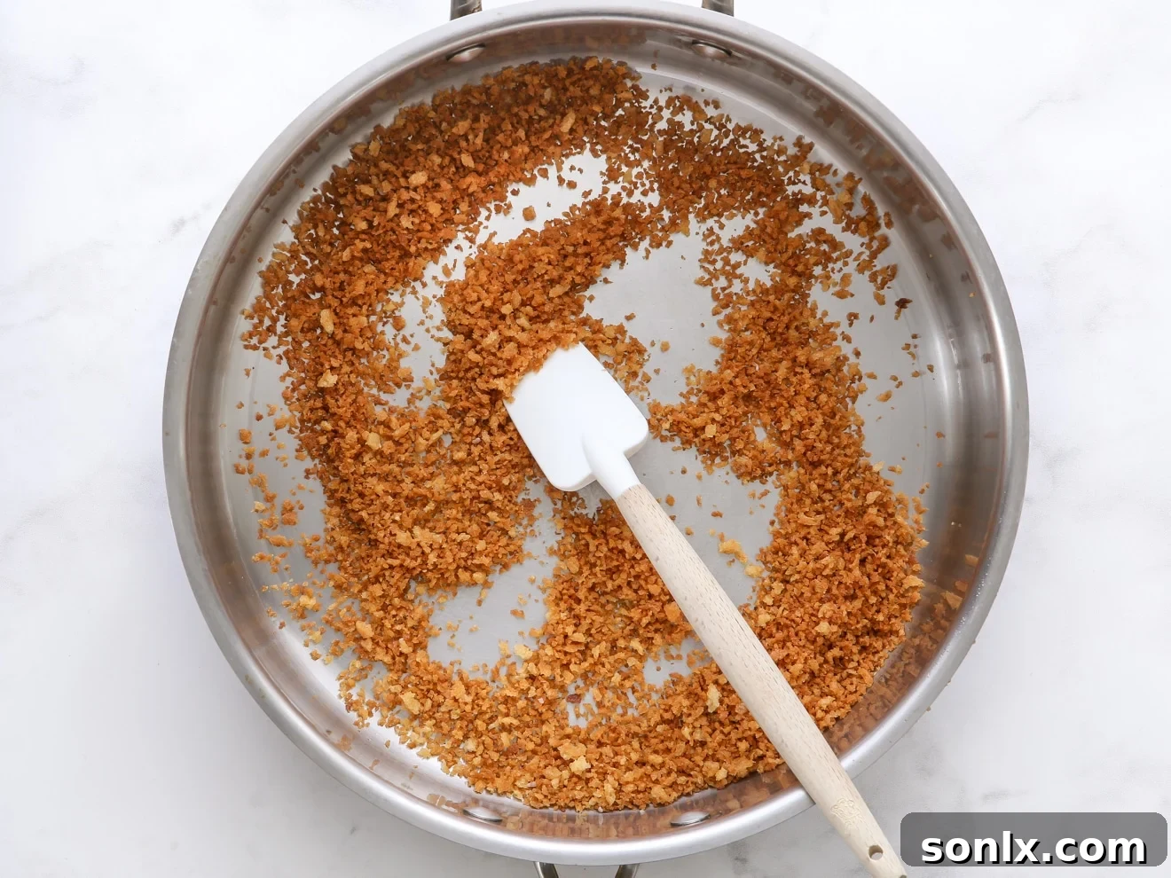 step 1: toast breadcrumbs in a skillet until golden