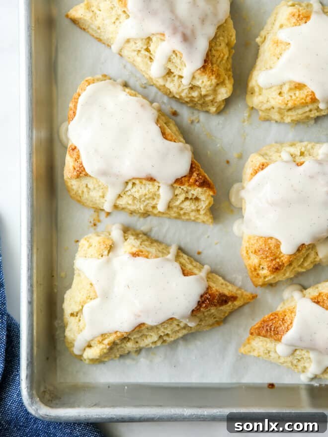 closeup of vanilla bean scones on a sheet pan