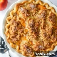 closeup of peach cobbler pie