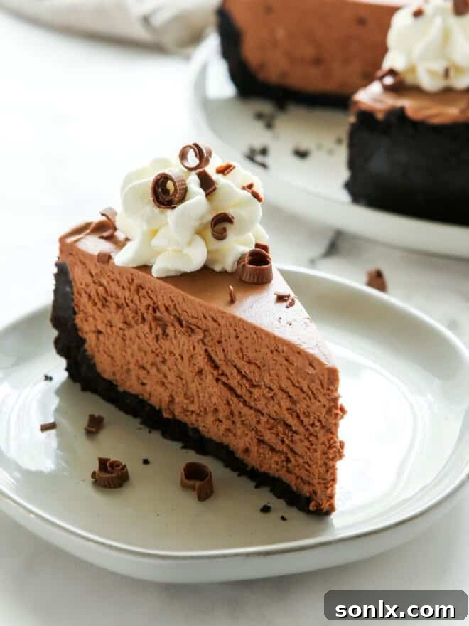 close up of a slice of no-bake chocolate cheesecake, highlighting its creamy texture