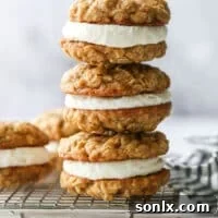 A beautiful stack of homemade oatmeal cream pie cookies on a cooling rack, ready to be enjoyed.