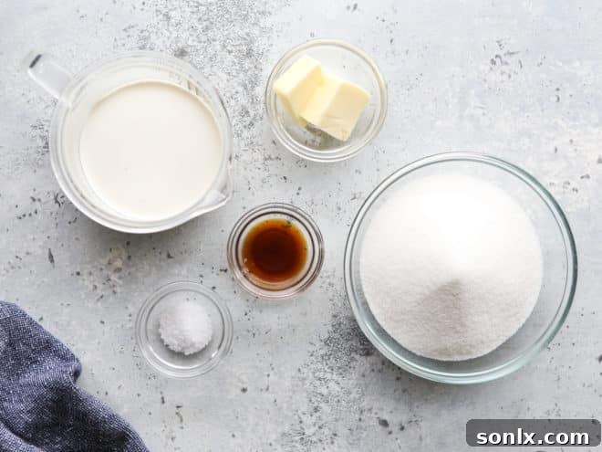 Only five key ingredients – sugar, heavy cream, butter, vanilla, and salt – are needed to make exquisite homemade caramel sauce.