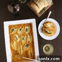 Kale and Ricotta Stuffed Shells with Butternut Squash Sauce from completelydelicious.com