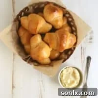 Sweet Potato Crescent Rolls with Whipped Honey Butter from completelydelicious.com