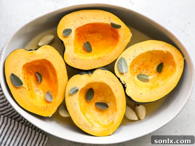 acorn squash in dish ready for roasting