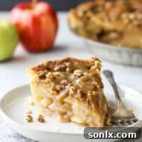 apple pear praline pie slice on plate