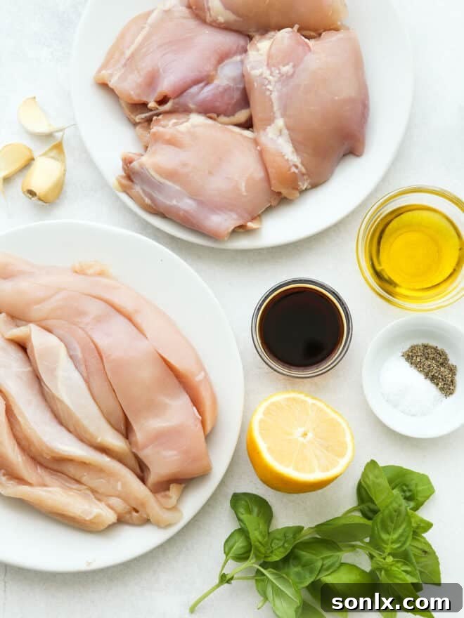 Fresh ingredients for grilled chicken marinade, including olive oil, lemon, herbs, and soy sauce, neatly measured out in small bowls