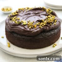 Decadent Chocolate Olive Oil Cake on an elegant serving plate