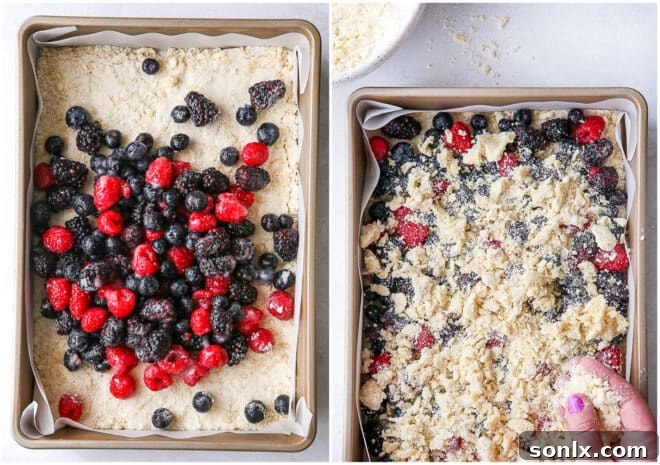 adding berry filling and crumb topping to the bars