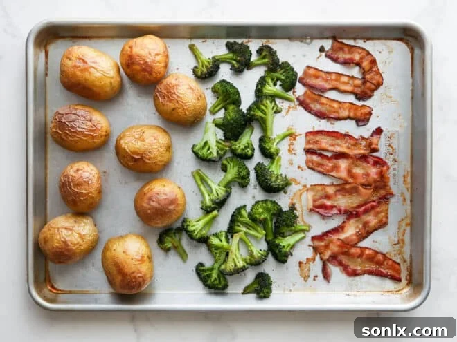 delicious baked potato sheet pan dinner, fully cooked and ready for a variety of toppings