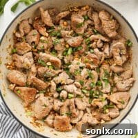 stir-fried thai lemongrass pork in a skillet