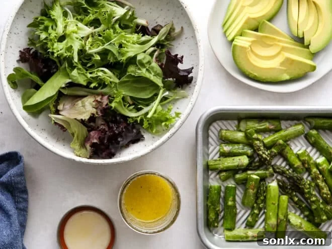 All the individual components of the roasted asparagus and avocado salad laid out before final assembly.