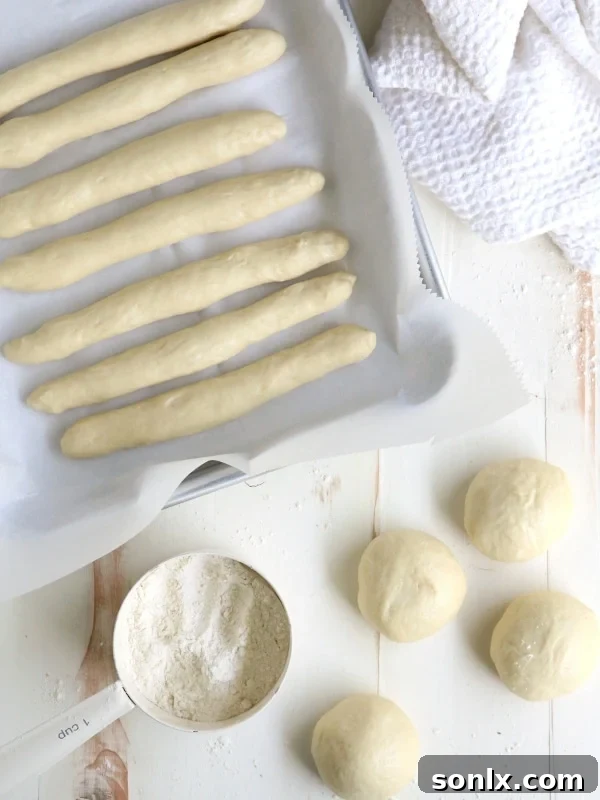 Freshly baked Pesto Parmesan Pull Apart Breadsticks arranged beautifully