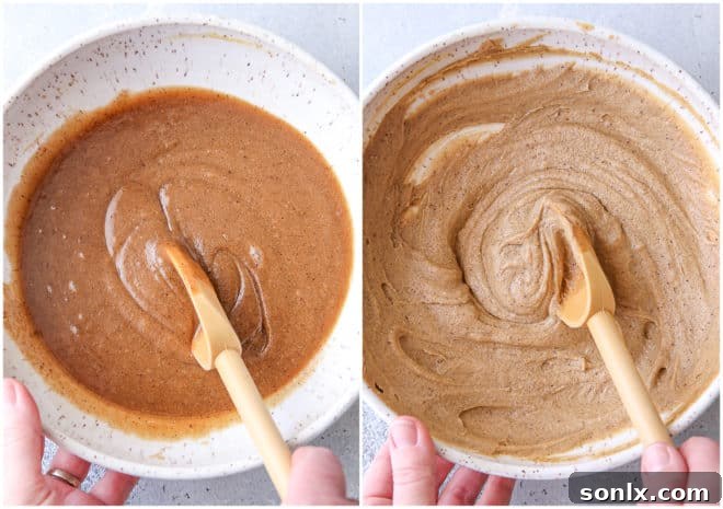 Mixing cookie dough by hand in a large bowl with a wooden spoon.