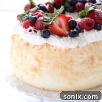 Coconut Angel Food Cake with Berries | completelydelicious.com