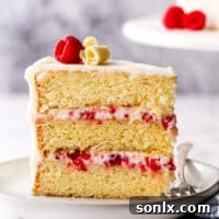 a slice of raspberry white chocolate cake