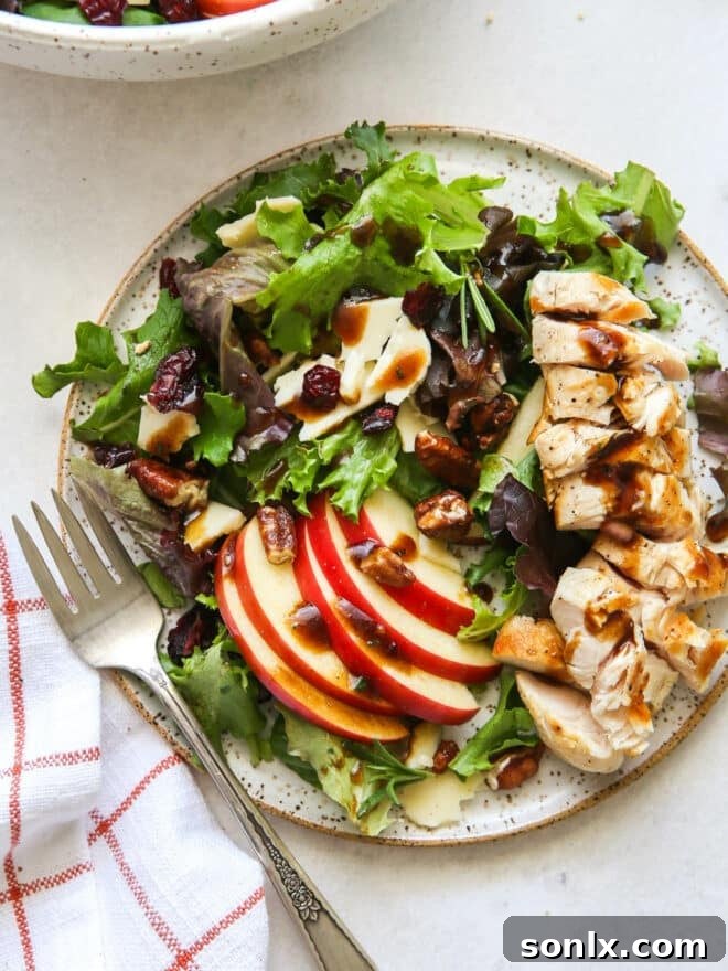 fall apple salad on a plate with roasted chicken