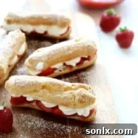 A delicious Strawberry Cheesecake Eclairs pastry.