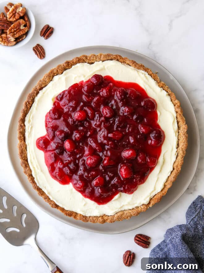 overhead view of cranberry mascarpone tart on plate