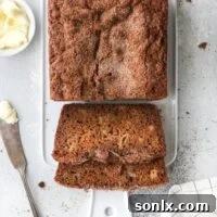 This classic banana bread with cinnamon crumble topping is an irresistible treat!