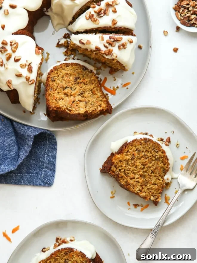 A beautifully frosted brown butter carrot bundt cake, ready to be served