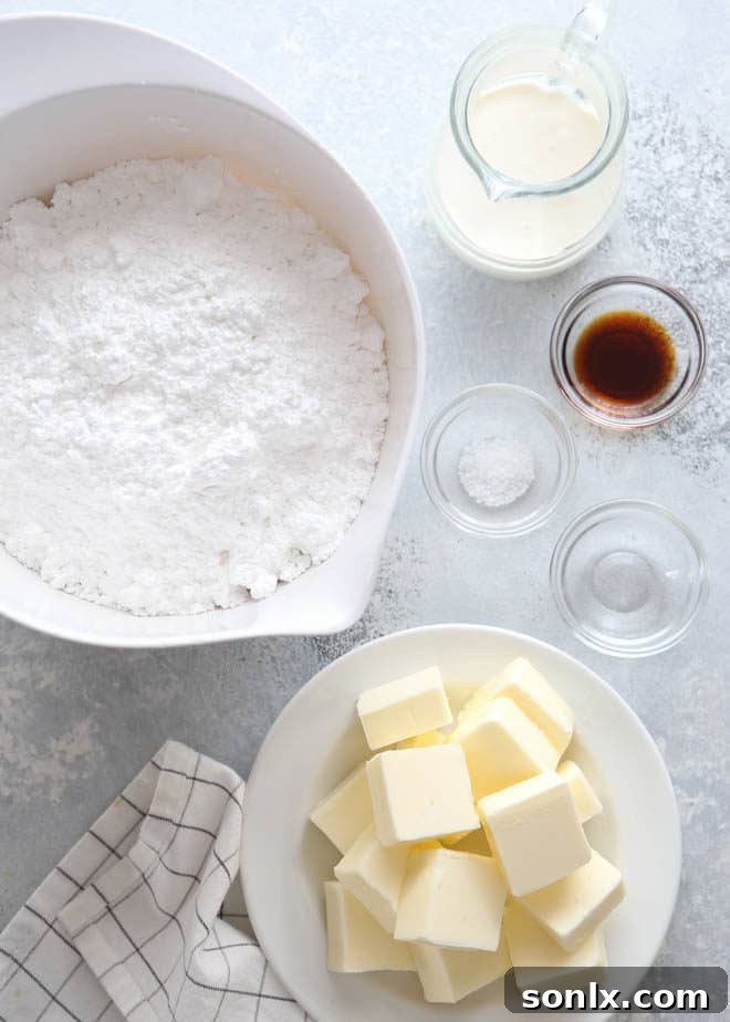 Key ingredients laid out for making whipped vanilla frosting