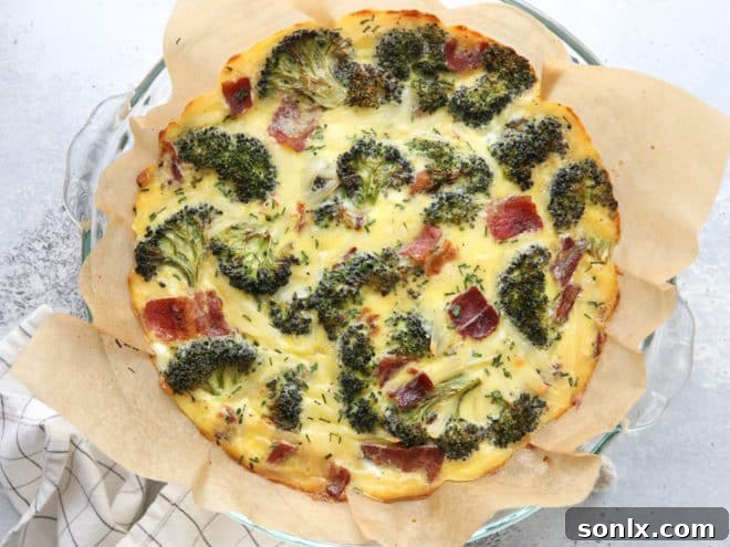 A breakfast bake filled with roasted broccoli, bacon, Gruyere cheese, eggs and chives. It’s a quiche minus the fussy pie crust!