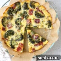 A breakfast bake filled with roasted broccoli, bacon, Gruyere cheese, eggs and chives. It’s a quiche minus the fussy pie crust!