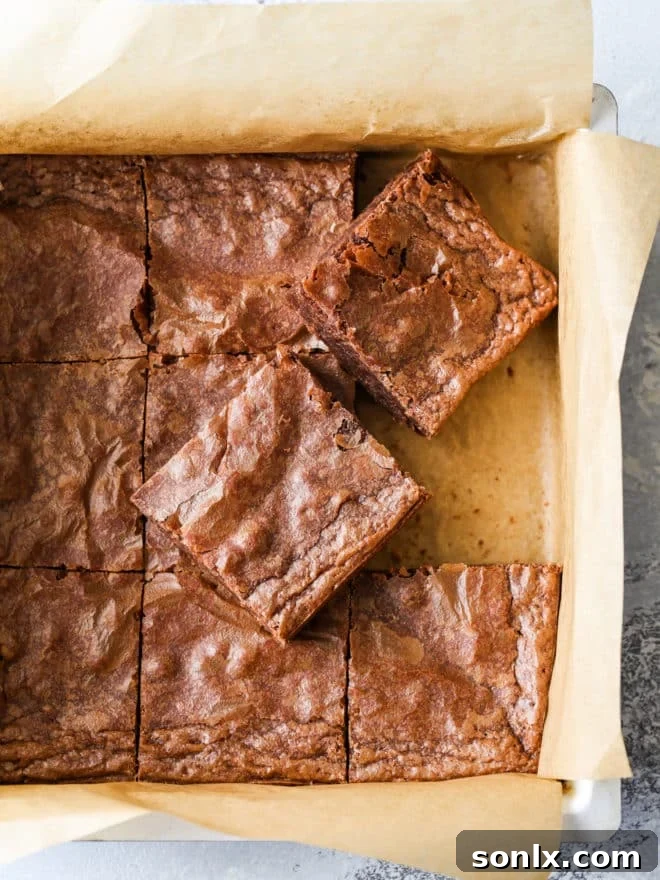 cutting classic fudge brownies in baking pan