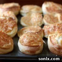 Golden savory cheese popovers, ready to be served